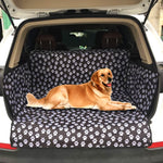 Load image into Gallery viewer, A Dog Laying On The Waterproof Dog Trunk Mat With Paw Prints

