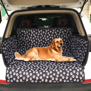 A Dog Laying On The Waterproof Dog Trunk Mat With Paw Prints
