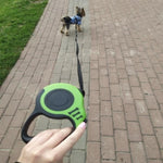 Load image into Gallery viewer, A Dog Using The Green Retractable Leash
