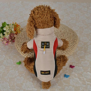 A Dog Wearing A Beige All Weather Dog Vest
