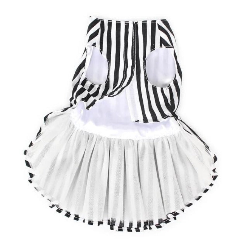 The Back Side Of The Black And White Striped Dog Dress With Lining And Velcro