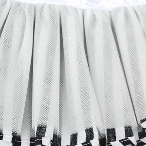 The Tulle Lining Of The Black And White Striped Dog Dress